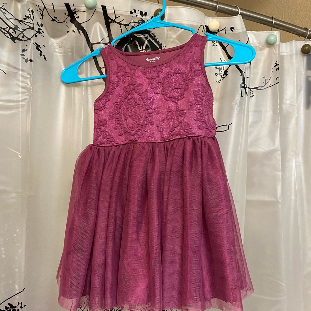 Nanette girl’s sleeveless slip over dress.